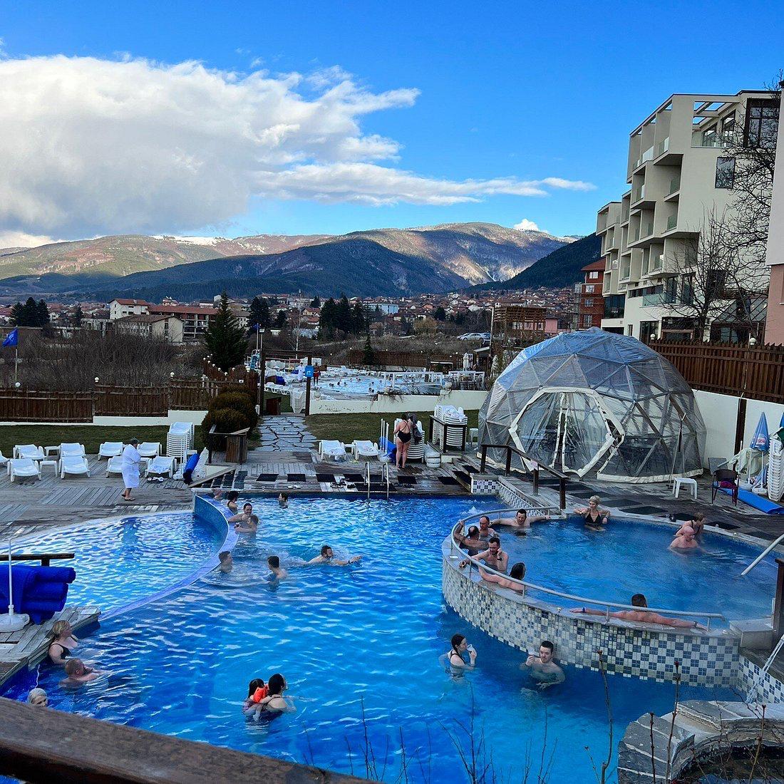 Circular thermal pool in Banya village near Bansko with Pirin mountain views